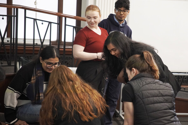 Nayana teaching students