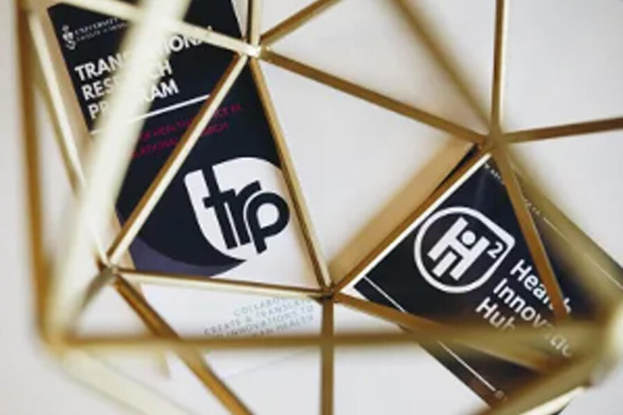 TRP postcards within a gold ornament