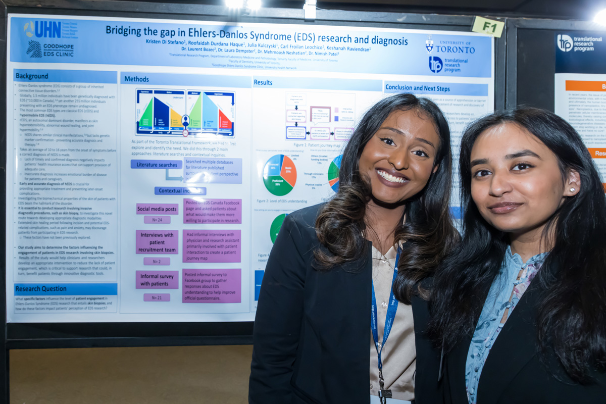 Roofaidah (right) with her project colleague, Keshanah Raviendran, presenting at the LMPRC 2024